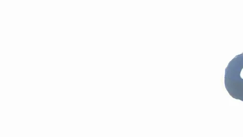 A squishy globe in an open hand with overexposed effect Stock Footage 104085446