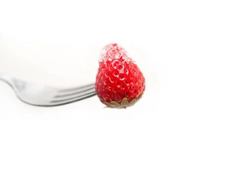 Srawberry on a fork isolated Stock Photos