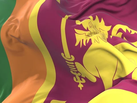 Sri Lanka flag waving at wind in slow in blue sky, loop Stock Footage 83137663