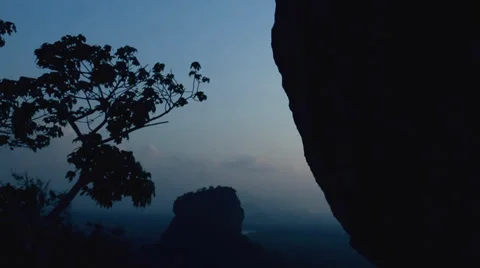 Sri Lanka- Tilt down boulder to Sigiriya Rock-1 Stock Footage 34755582