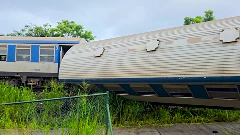 Sri Lanka Train Crash: Overturned Passenger Coach and Track Damage. 4K Video stock 334985963