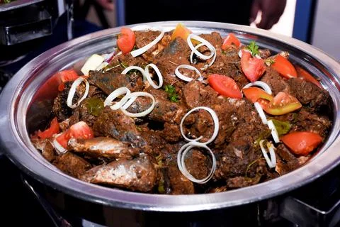 Sri Lankan deviled fried fish buffet Stock Photos