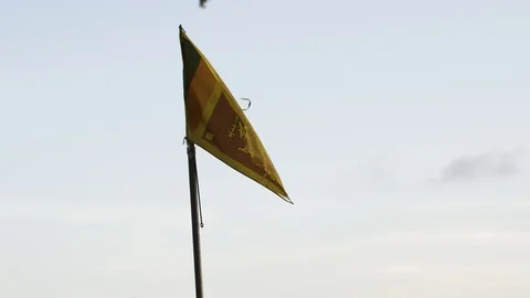 Sri Lankan flag flapping in air on a sunny day Stock Footage 71564130