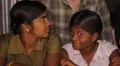 Sri Lankan girl sitting on floor and smiling HD Footage