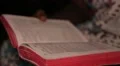Sri Lankan woman reading from the Bible at church HD Footage