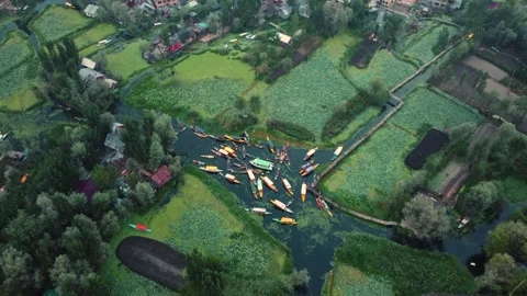 Srinagar, India-August 15 2025- Drone view of the vibrant floating market Stock Footage 310786126