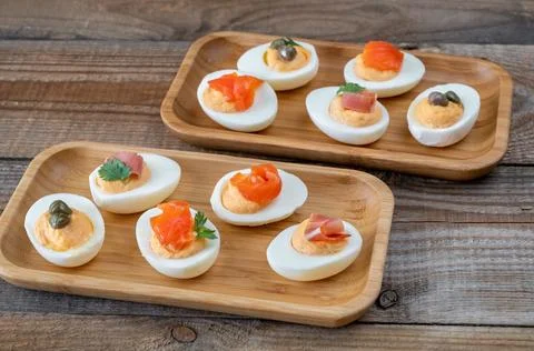 Sriracha deviled eggs with different toppings Stock Photos