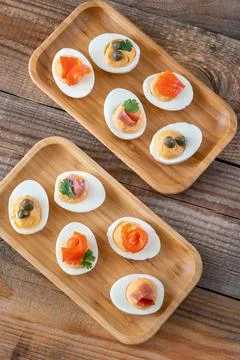 Sriracha deviled eggs with different toppings Stock Photos