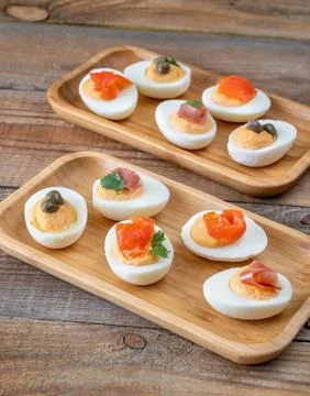 Sriracha deviled eggs with different toppings Stock Photos