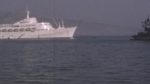 SS Canberra Passenger Ship and Naval Vessel in Mediterranean Harbor 1960s Stock Footage 337017345