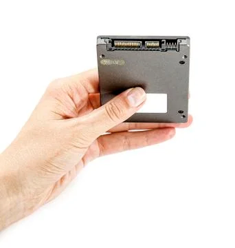 SSD hard drive in hand Stock Photos