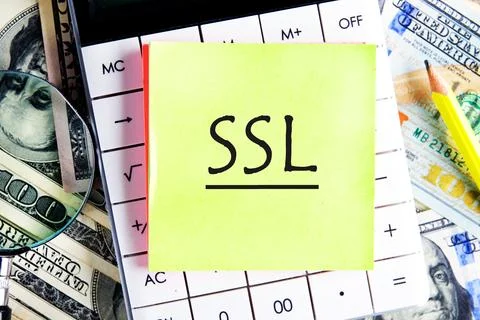 SSL Secure Sockets Layer on a yellow sticker on the calculator against the ba Foto stock