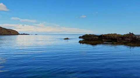 St Abbs Bay, Scottish Borders, looking out to sea, panning Stock-Footage 246318001