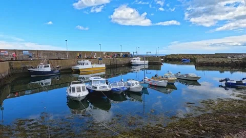 St Abbs Harbour, Scottish Borders, with Fishing and Dive Boats Stock Footage 246327935