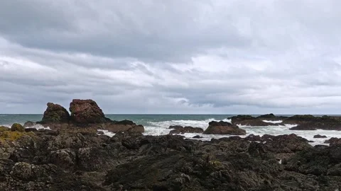 St Abbs waves on rocks near harbour Stock Footage 234574124