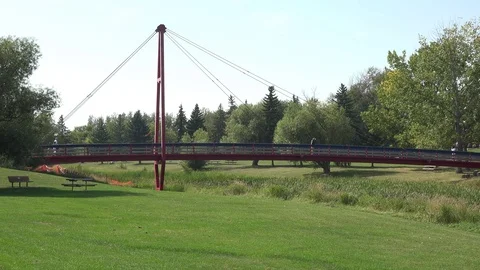 St. Albert Alberta Canada - July 2017: Walking Bridge Stock Footage 114949491