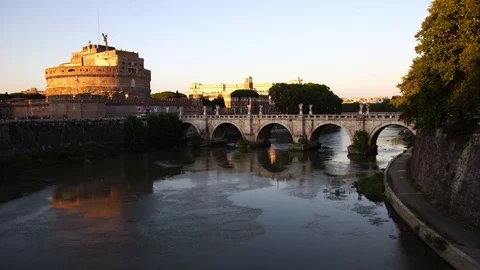 St. Angelo bridge to Castel Sant Angelo on Tiber river. Historic landmark Rome Stock Footage 125882285