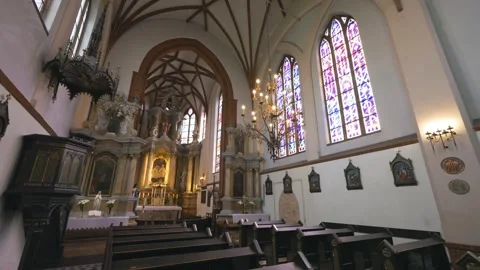 St. Anne's Church featuring gothic interior and illuminated altar 스톡 동영상 334676467