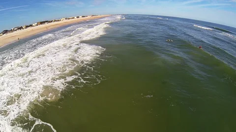 St. Augustine FL Aerial of surfers Stock Footage 34542525