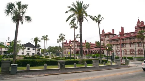 ST AUGUSTINE, FL - APRIL 9, 2018: Flagler College exterior view with tourists Stock Footage 332018335