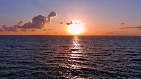 St Augustine FL Beach Sunrise Aerial Low fly From Sun2 &amp; down Stock Footage 248392544