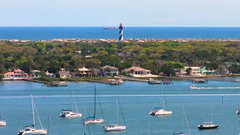 St. Augustine, Florida. Historical lighthouse on ocean shore for ships Stock Footage 329142834