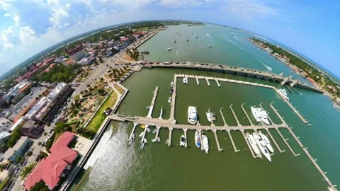 St Augustine Florida shot with fisheye aerial drone over the river towards .. Vídeo Stock 337917178