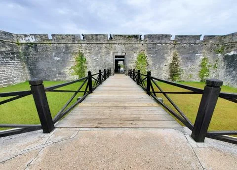 St Augustine, Florida, U.S - November 18, 2023 - The wooden bridge into Cas.. Stock Photos