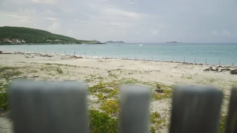 St Barts beach barriers moving shot Stock Footage 168776375