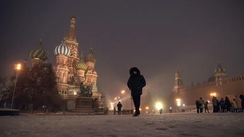 St. Basil's Cathedral and Red Square during a snowfall in Moscow, Russia Video stock 120806608