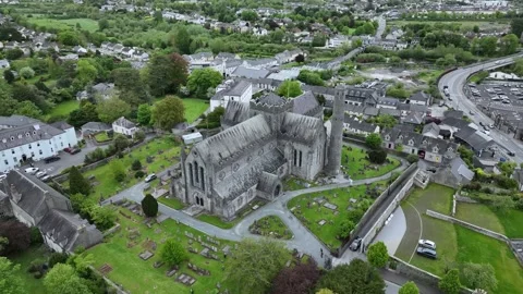 St. Canice's Cathedral and Round Tower 5k Stock Footage 240940701