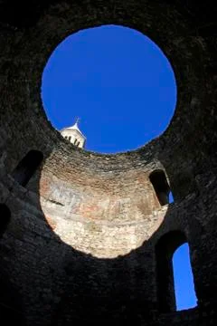 St Dujam belfry viewed through the Vestibul, entrance to the living quarters  Stock Photos