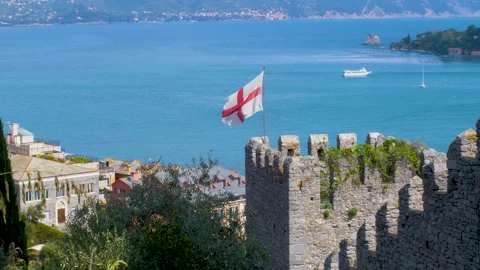 St. George's Flag waving above Portovenere Stock Footage 255111841