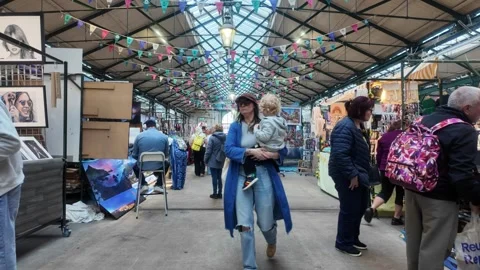 St. George's Market - Visitors Exploring The Historic Victorian Indoor Market. Stock-Footage 338222145