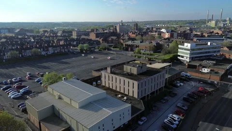 St Helens town centre aerial view circling across police and court offices and Stock Footage 307387622