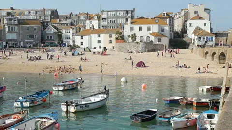 St Ives harbour beach boats Cornwall UK Stock Footage