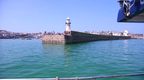 St Ives Lighthouse and Harbour from boat Stock Footage 48388629