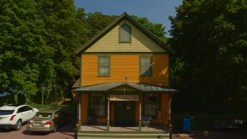 St James Historical General Store Forward Aerial Pan Zoom In Stock Footage