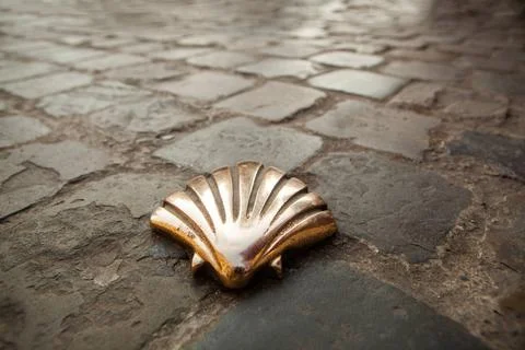 St James shell in Brussels Milestone in shape of a shell inserted in the p... Stock Photos