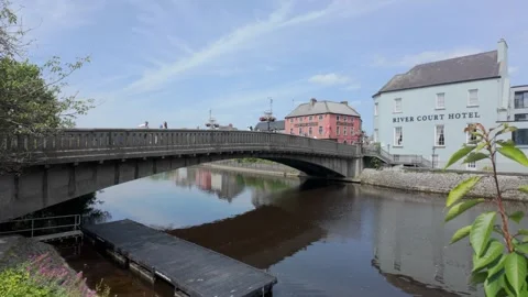 St. John's Bridge spans the River Nore in Kilkenny, Ireland, with nearby Stock Footage 311765451