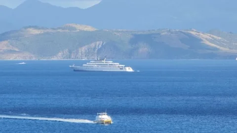 St. Kitts Island View of Small Boat Cruising the Atlantic Sea Stock Footage 237957894
