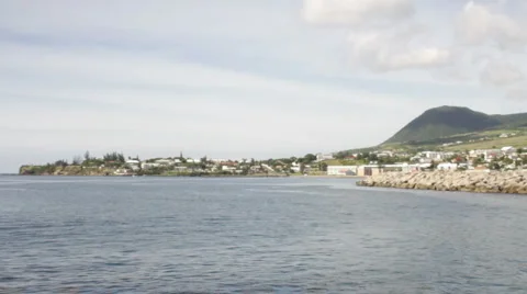 St Kitts with tugboat at dock Stock Footage 998660
