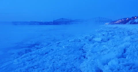 St. Lawrence river with Quebec Bridge at dawn winter Stock-Footage 61296591