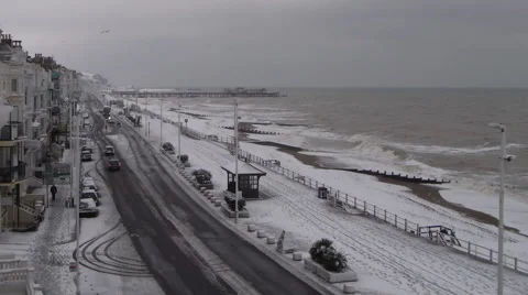 St Leonards, Hastings seafront winter snow time lapse Stock Footage 66576116
