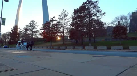 St Louis Arch and Buggy 2 HD Horse and White Carriage at Sunset Stock Footage 12633701