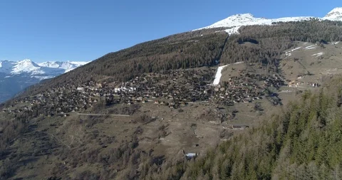 St-Luc artificial snow spring approach - Aerial 4K Stock Footage 105018170