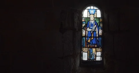 St. Margaret Window as door opens and closes on right to reveal light Video stock 123138499