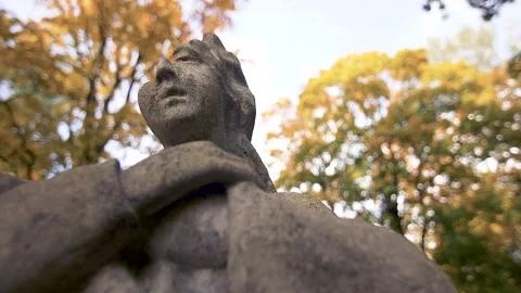 St. Maria statue with broken head at the Bernardine XIX century cemetery. Stock Footage 155580744