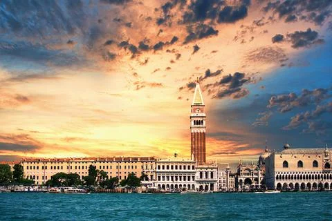 St Mark's Square bell tower at sunset with the Grand Canal empty during the covi 写真素材