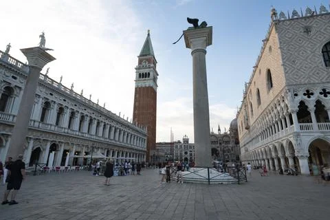 St. Mark's square bell tower and columnist Stock Photos